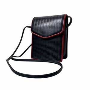 DOKKIM VINTAGE RARE DESIGNER BLACK LEATHER CROSSBODY BAG.